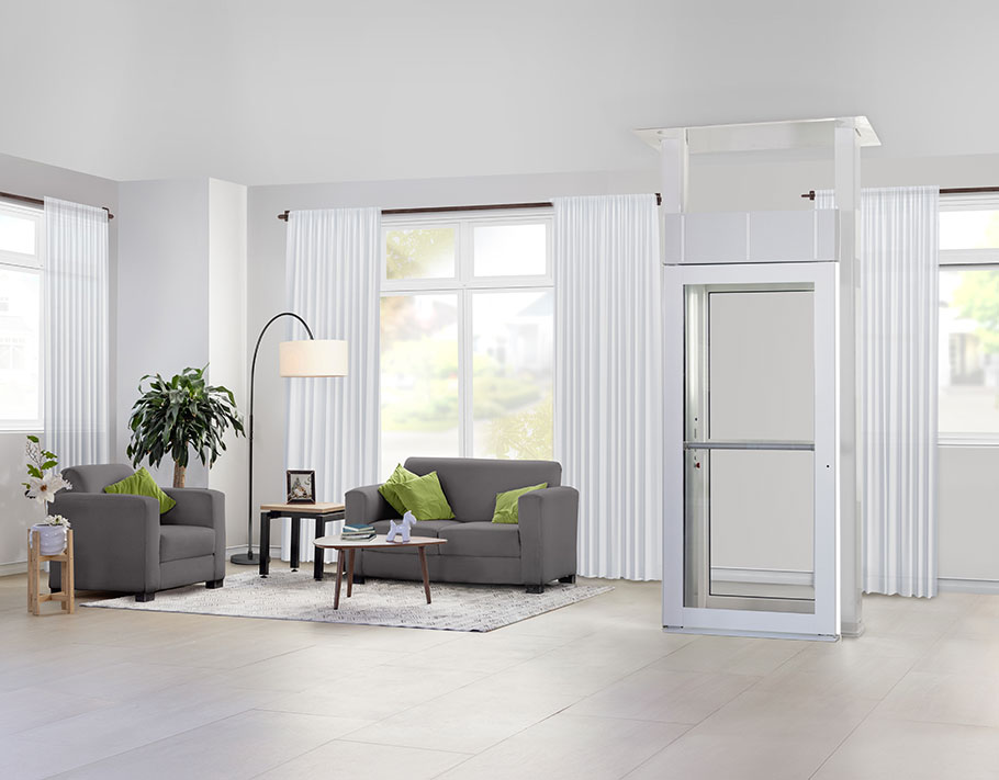 LUMA Homelift installed in a bright modern living room with light wood floors and contemporary furniture