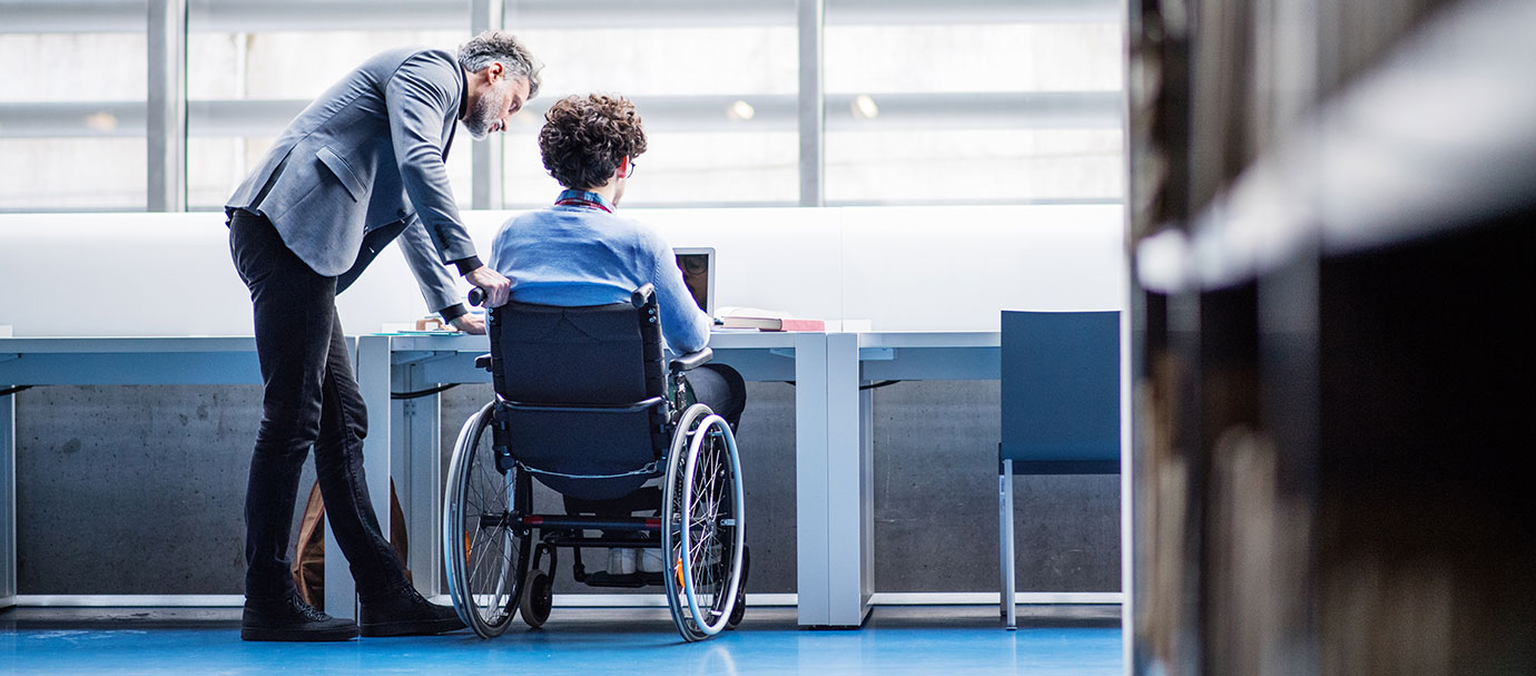 Garaventa Lift Italy Solutions disabili/Man teaches a young boy in a wheelchair