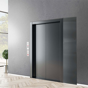 LULA limited-use/limited-application elevator with sleek black stainless steel doors